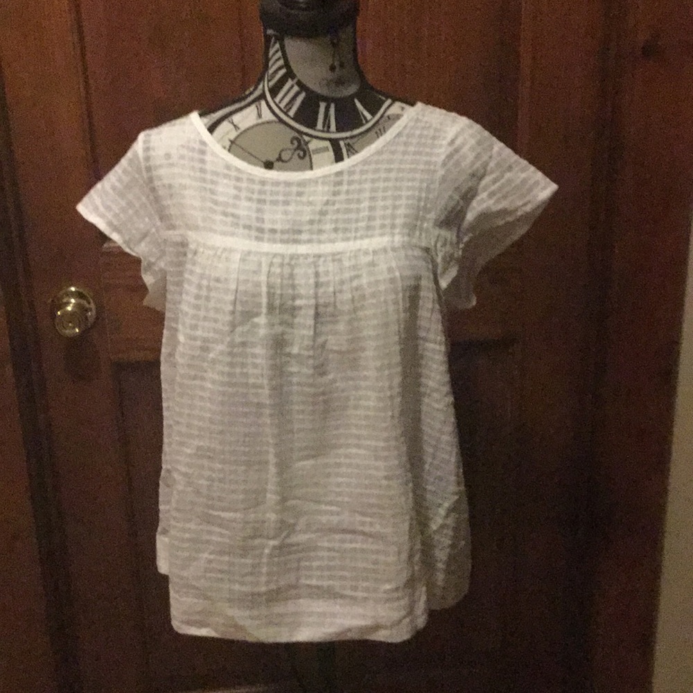 White sleeveless peasant blouse